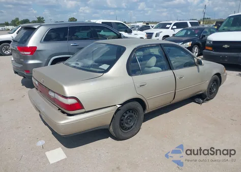 1996 Toyota Corolla Dx z USA, uszkodzony, nr VIN 1NXBB02E5TZ357940